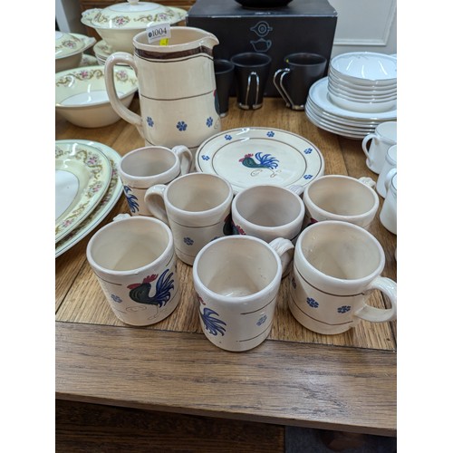 1004 - Nicola Fasand studio pottery inc. seven mugs, jug and six side plates