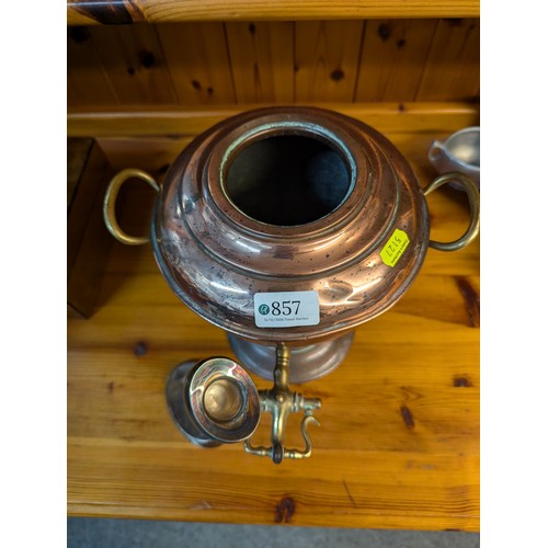 857 - Copper and brass samovar, height 34cm, together with a Modernist silver plated candlestick