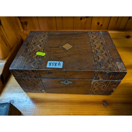 858A - Inlaid box with contents, wooden fruit in bowl and a puzzle