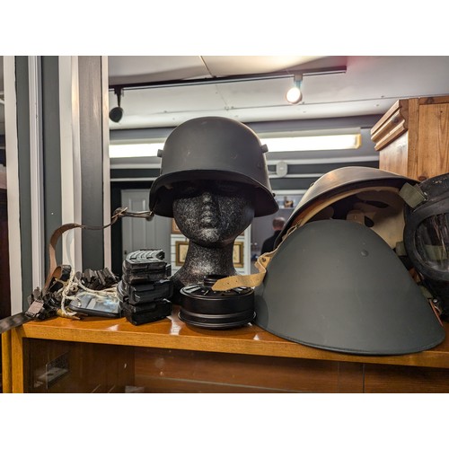 867 - USA style metal helmet, re-enactment helmets with liners, gas mask, three cartridge magazines & ... 