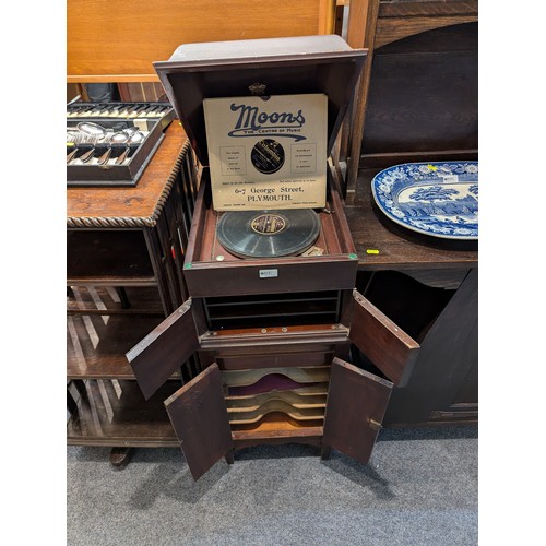 897 - His Master's Voice gramophone in cabinet with lower storage cupboard, not winding