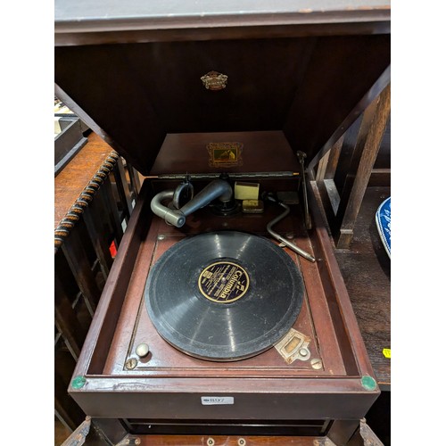 897 - His Master's Voice gramophone in cabinet with lower storage cupboard, not winding