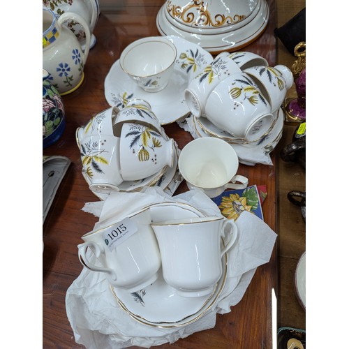 1015 - Colclough and Queen Anne cups and saucers etc.