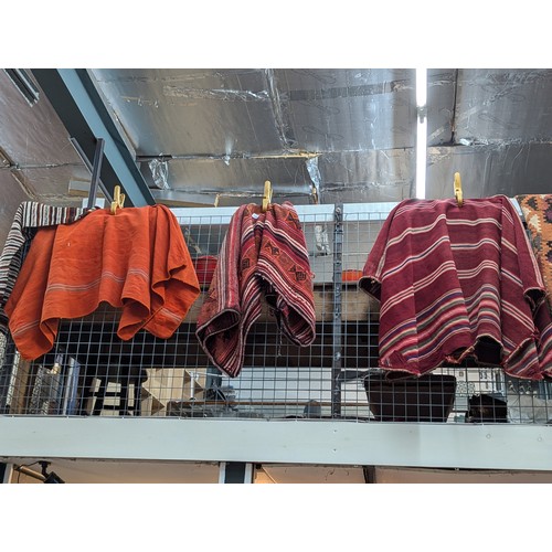 1042 - Three South American ponchos