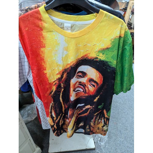 1026 - Eighteen assorted colourful t-shirts, inc. Bob Marley, in sizes XL & XXL