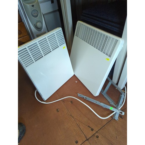 316 - 2 x wall-mounted electric convector heaters. 1 is 45cm x 45cm, 1 is 45cm x 36cm.