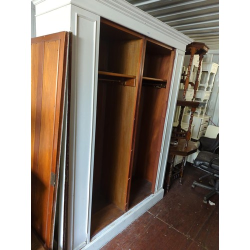 339 - White double wardrobe with mirrored doors. W152cm D48cm H215cm.