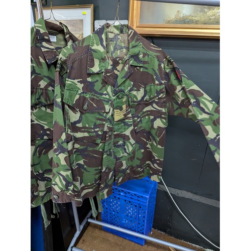 1035 - Four camouflage jackets and matching trousers