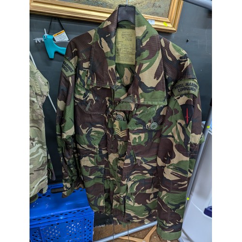 1035 - Four camouflage jackets and matching trousers