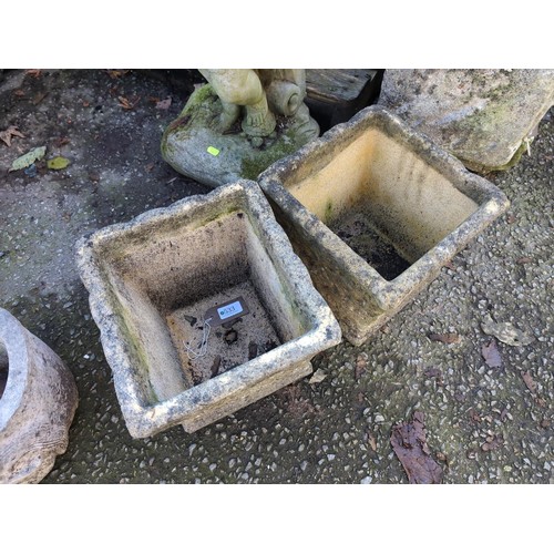 533 - 2 square concrete planters. W24cm D25cm H24cm.