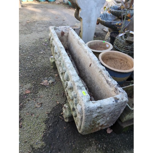 535 - Figurative concrete trough. W109cm D25cm H45cm.