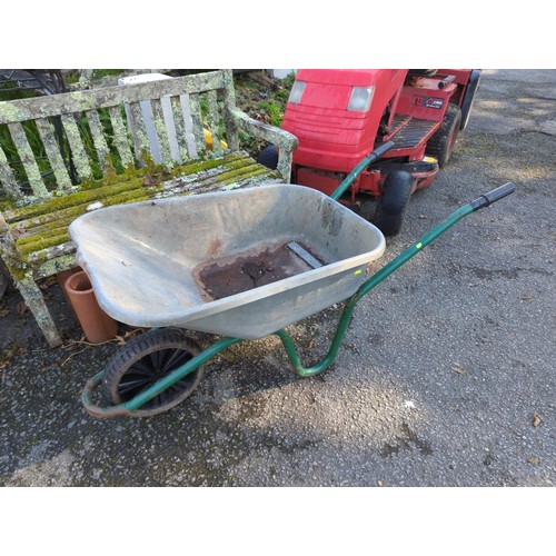 439 - Galvanized wheelbarrow with hard wheel. 