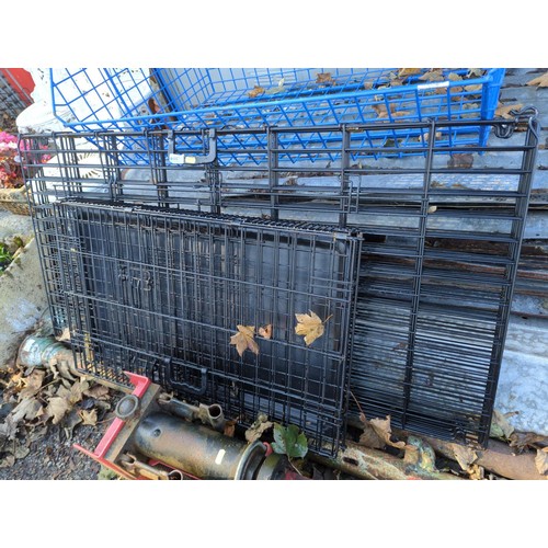 447 - Large and small dog crates. Large one without plastic tray.