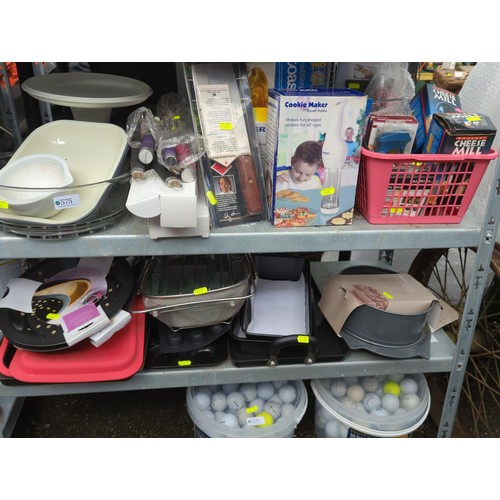 575 - 2 shelves of cookware inc. baking tins, whisks etc.