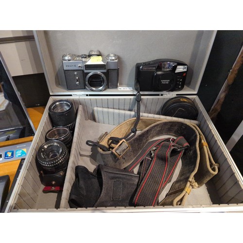 87 - Camera case and contents: Zenit-E slr, Olympus 700xb cameras, Schneider-Kreuznach tele-xenar 1:3.5/1... 