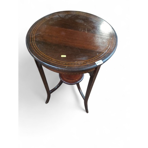 95 - Mahogany inlaid circular table with lower shelf. Diameter 54cm H73cm.