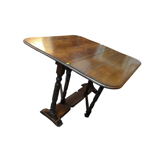 22 - Drop-leaf gateleg table. Folded - W104cm D28cm H74cm. Unfolded D105cm. 