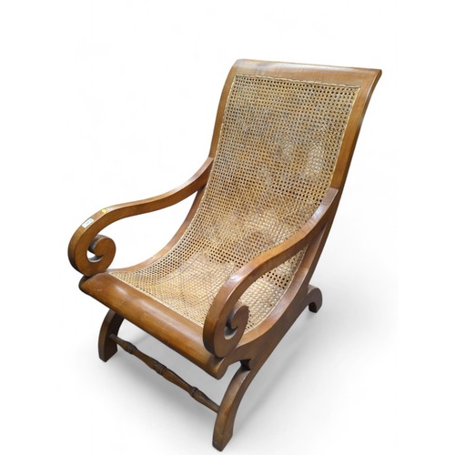 46 - Large rattan armchair. W62cm D105cm approx. H94cm.