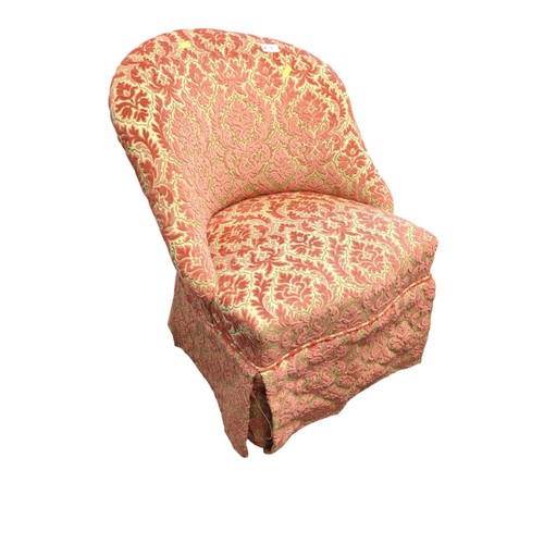 74 - A floral upholstered wheeled bedroom chair