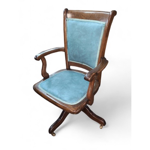 78 - Marble and Shuttcock oak swivel and tilt chair (early C.20th?). Made in Bedford, Ohio, USA. W59cm H9... 