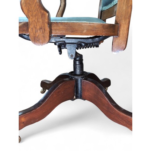 78 - Marble and Shuttcock oak swivel and tilt chair (early C.20th?). Made in Bedford, Ohio, USA. W59cm H9... 