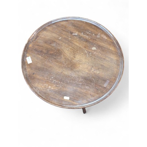 82 - Circular flip top wine table. Diameter 84cm H73cm.