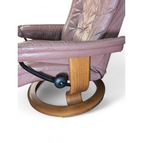 83 - Ekornes Stressless reclining chair and footstool. W88cm H102cm.