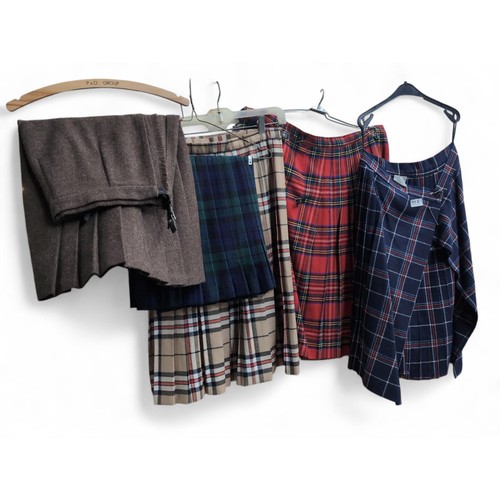 99A - Five various kilts inc. Murray Bros.