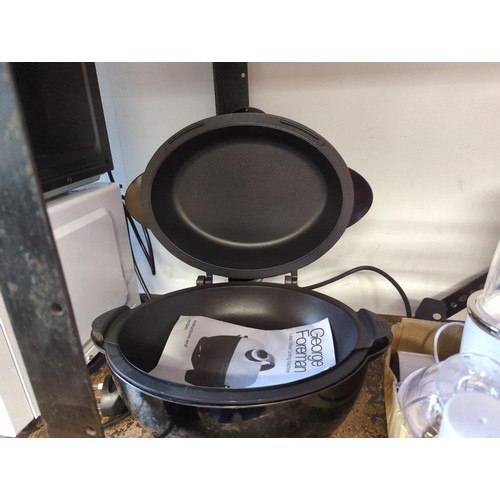 51 - George Foreman Lean Mean Grilling Machine. Model no. 14283-20.