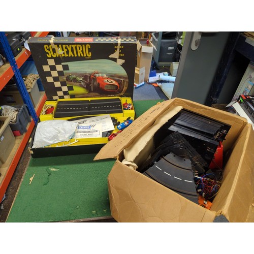 76 - Tri-ang Scalextric set in box together with a box of accessories and track etc.