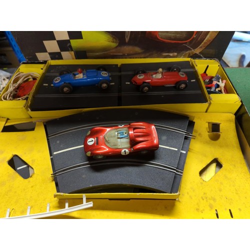 76 - Tri-ang Scalextric set in box together with a box of accessories and track etc.