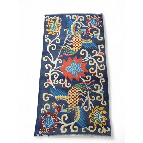 897 - Birds of paradise rug in blues and red, 91 x 182cm