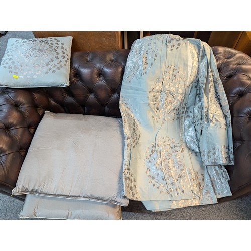 900 - Two pairs of Laura Ashley green ground silver floral curtains and three Laura Ashley cushions, width... 