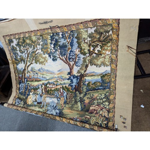 916 - Incomplete large tapestry on frame, width of frame 190cm