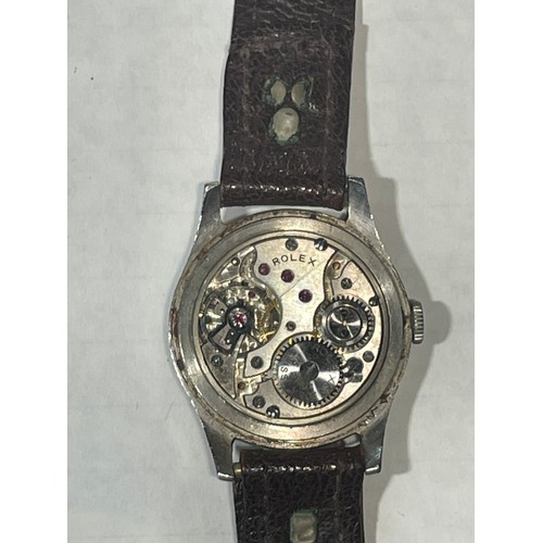 11 - Rolex Shock Resisting stainless steel cased watch, circa 1940s, the signed champagne dial with appli... 