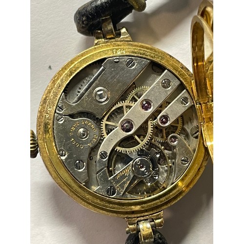 22 - Grand Prix ladies 18ct gold and enamel cased watch, engine-turned gilt coloured dial with Arabic num... 