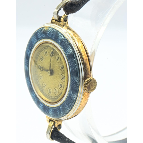 22 - Grand Prix ladies 18ct gold and enamel cased watch, engine-turned gilt coloured dial with Arabic num... 