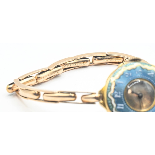 24 - 18ct gold and enamel cased ladies watch, silver dial, with blue and white enamel surround with Arabi... 