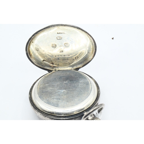 36 - Late Victorian ladies silver cased keyless wind open faced fob watch, the white enamel dial with Rom... 