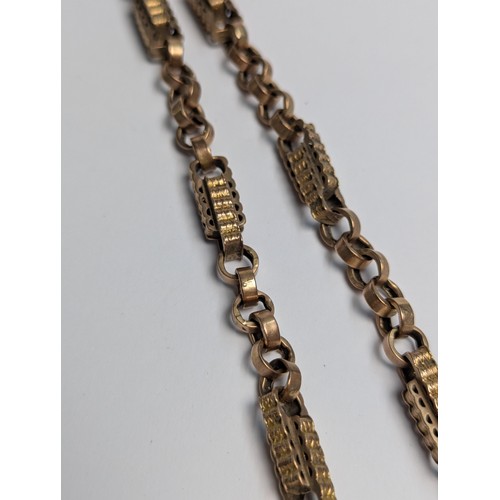 41 - Yellow metal bar and link Albert chain with T-bar marked 9c (chain end clasp missing) with a central... 