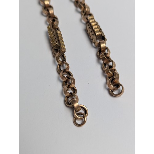 41 - Yellow metal bar and link Albert chain with T-bar marked 9c (chain end clasp missing) with a central... 