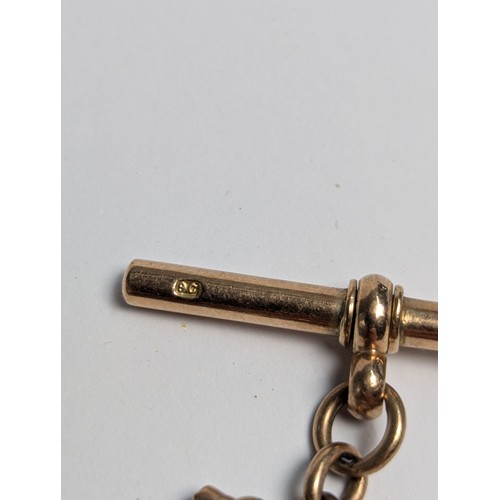 41 - Yellow metal bar and link Albert chain with T-bar marked 9c (chain end clasp missing) with a central... 