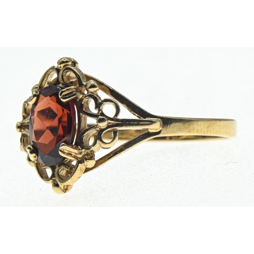 46 - 9ct gold and garnet ring, hallmarked Birmingham 2000, size M, gross weight 1.41 grams