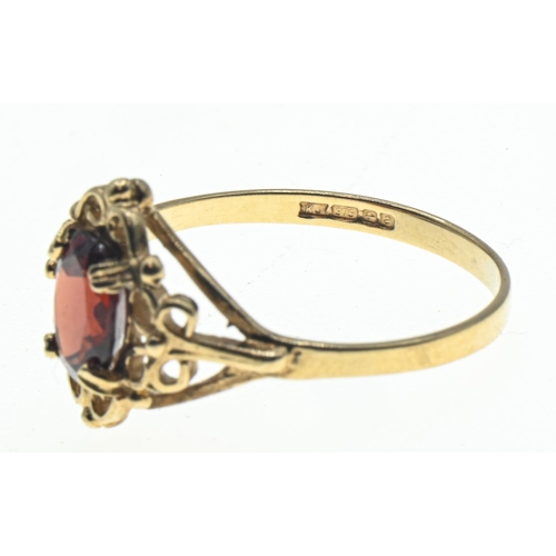 46 - 9ct gold and garnet ring, hallmarked Birmingham 2000, size M, gross weight 1.41 grams