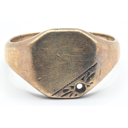 52 - 12ct gold signet ring, stamped 12K 500, size R, 6.4 grams, accent stone deficient