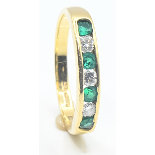 54 - 18ct gold, diamond & green stone half hoop channel-set ring, London import hallmark, size J... 