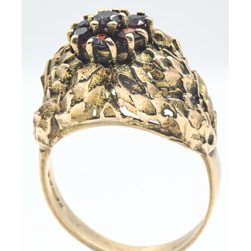 55 - 9ct gold and garnet cluster ring, with foliate mount, British hallmarked 375, size Q1/2, gross weigh... 