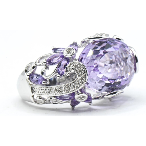 56 - Impressive 14ct white gold, amethyst and diamond cocktail ring, stamped 14K and with Birmingham hall... 