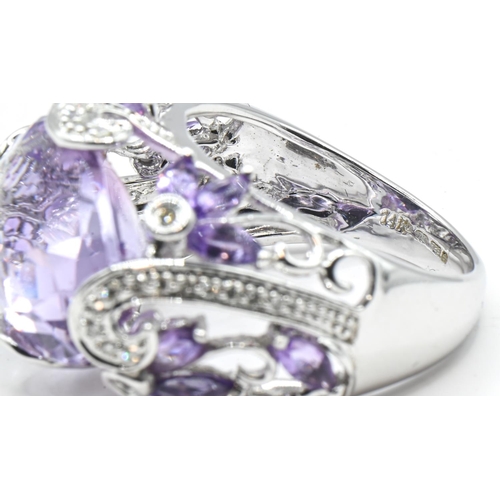 56 - Impressive 14ct white gold, amethyst and diamond cocktail ring, stamped 14K and with Birmingham hall... 