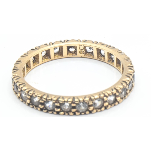 64 - 9ct gold and white stone eternity ring, stamped 9ct, size N1/2, gross weight 2.11 grams